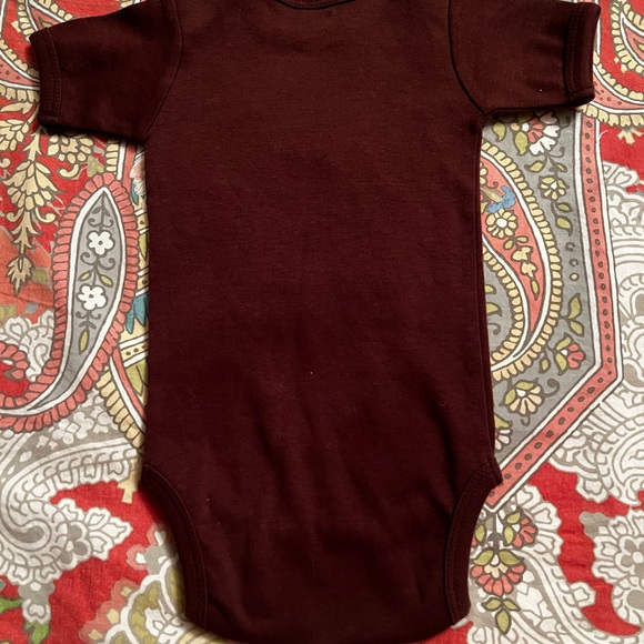 Brown Baby Onesie with Fun Text Blue what happens at Grandma stays at Grandma’s - Picture 3 of 5